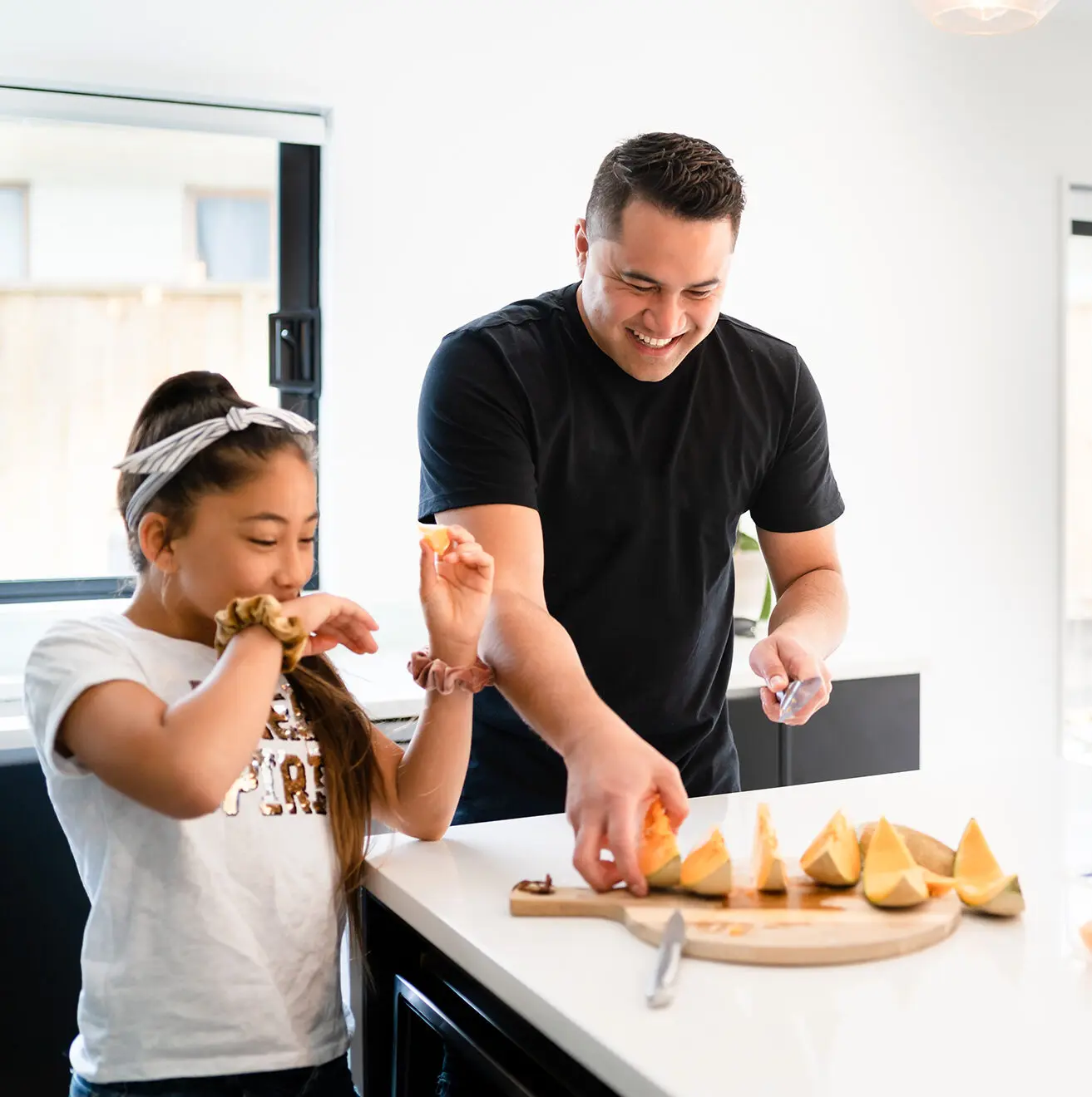 Family having healthy breakfast at home with kids