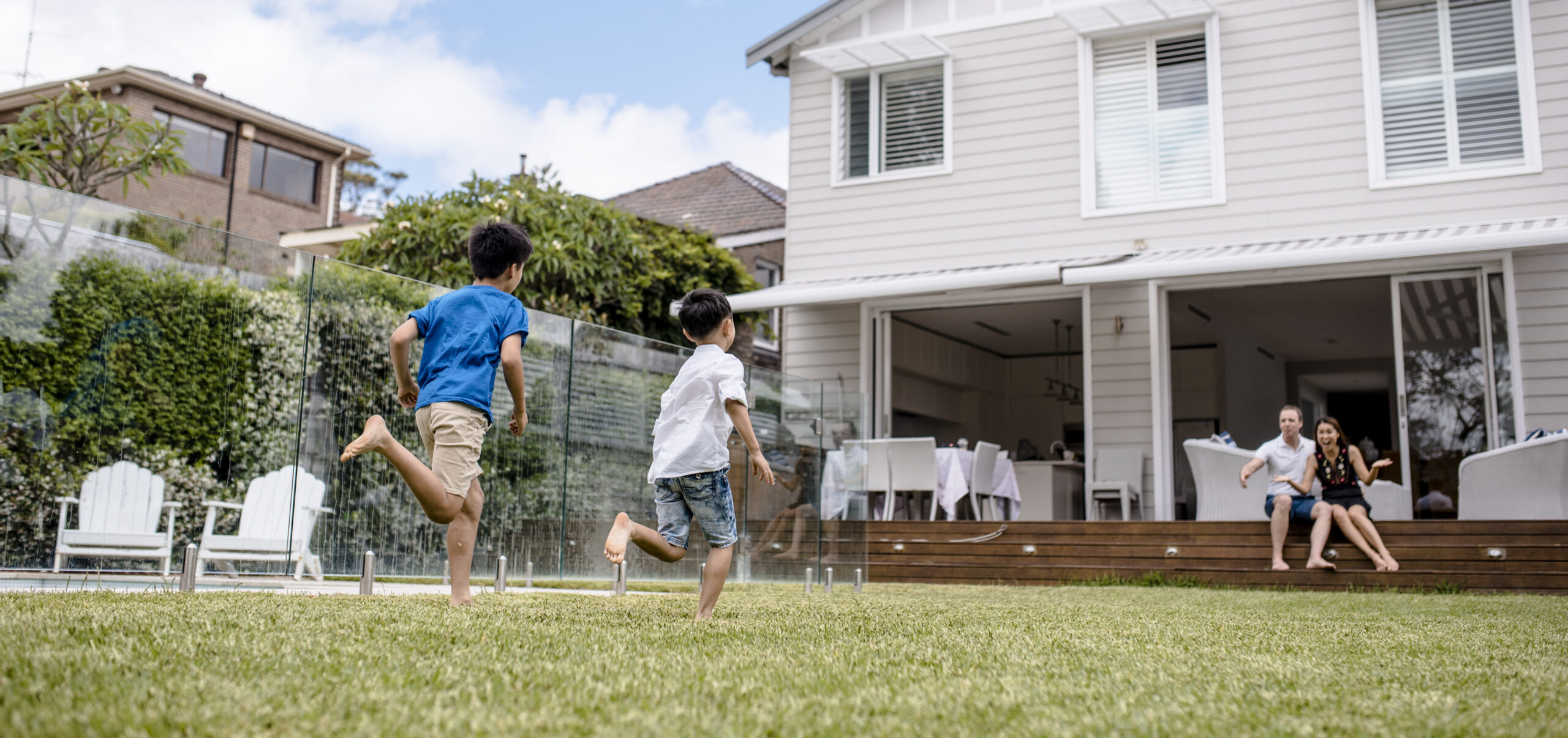 Brothers playing outdoors in spring
