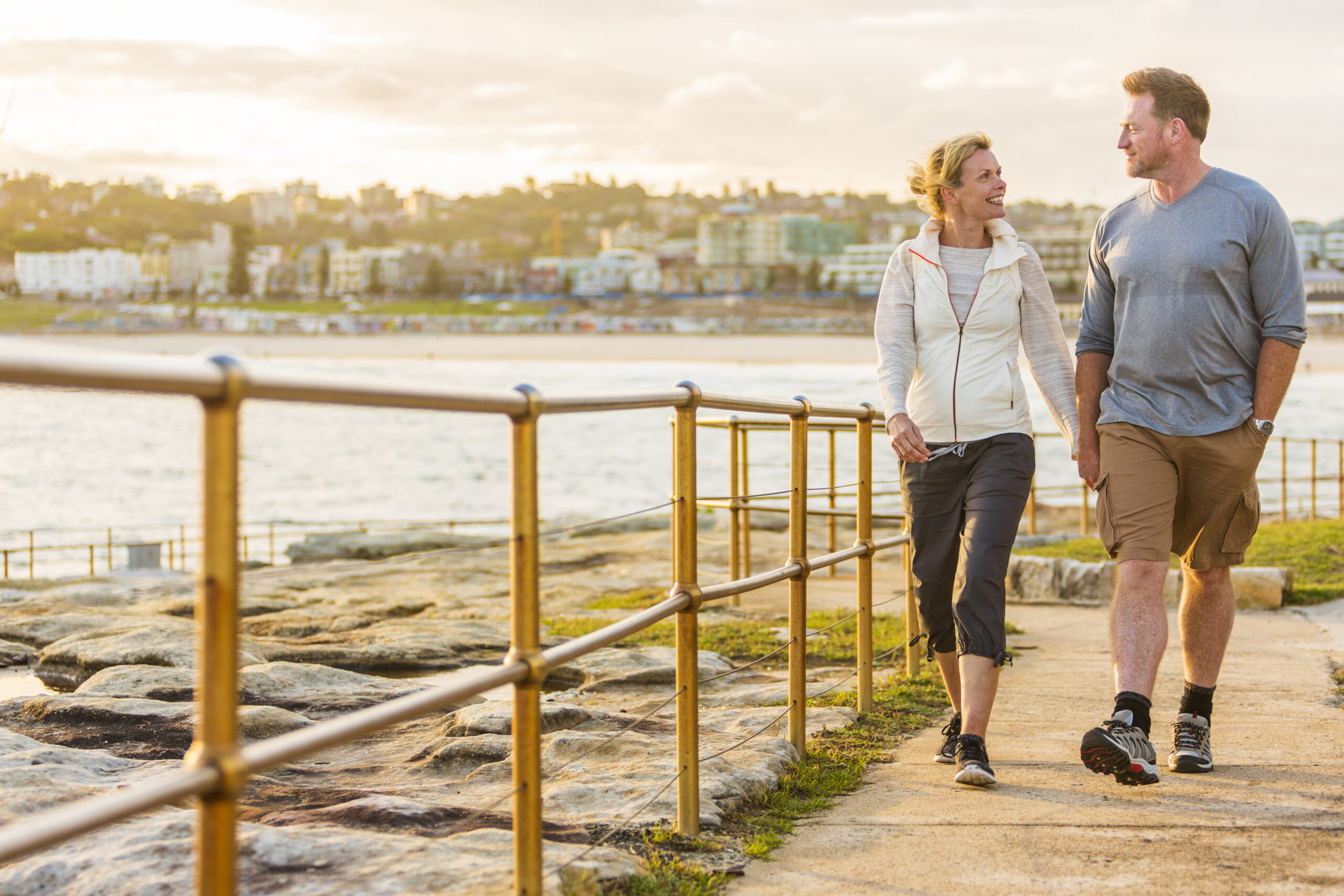 Happy Middle Aged Active Fit Healthy Beach Couple Walking Outdoors