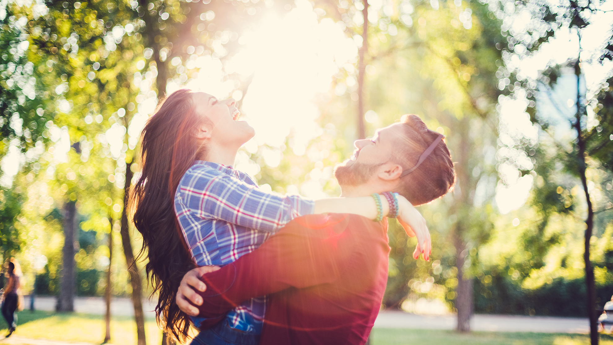 Enthusiastic young couple outside