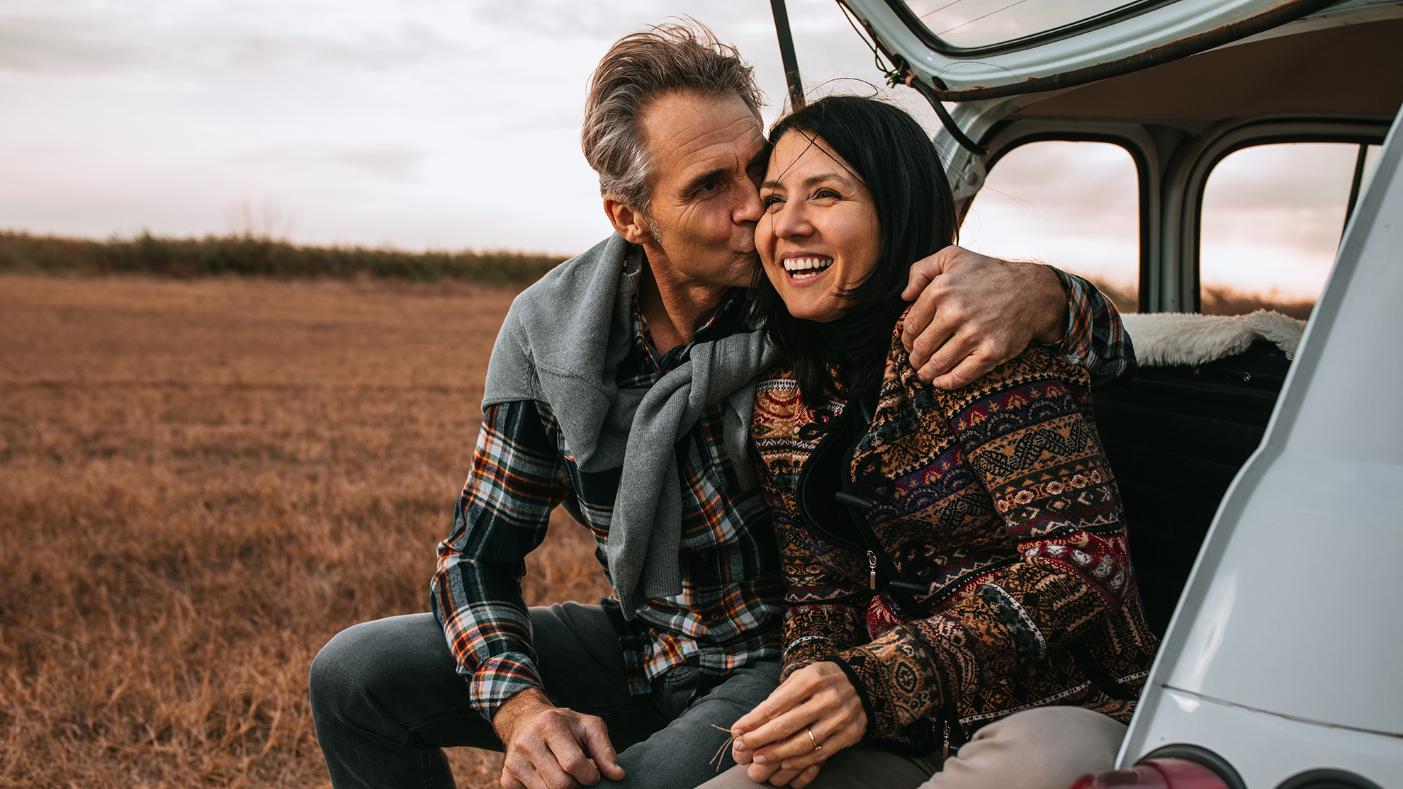 Lovely couple spending autumn day outdoors